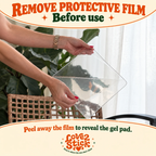 Peeling the protective film off a Clear Love2Stick Nano Gel Grip Pad before use