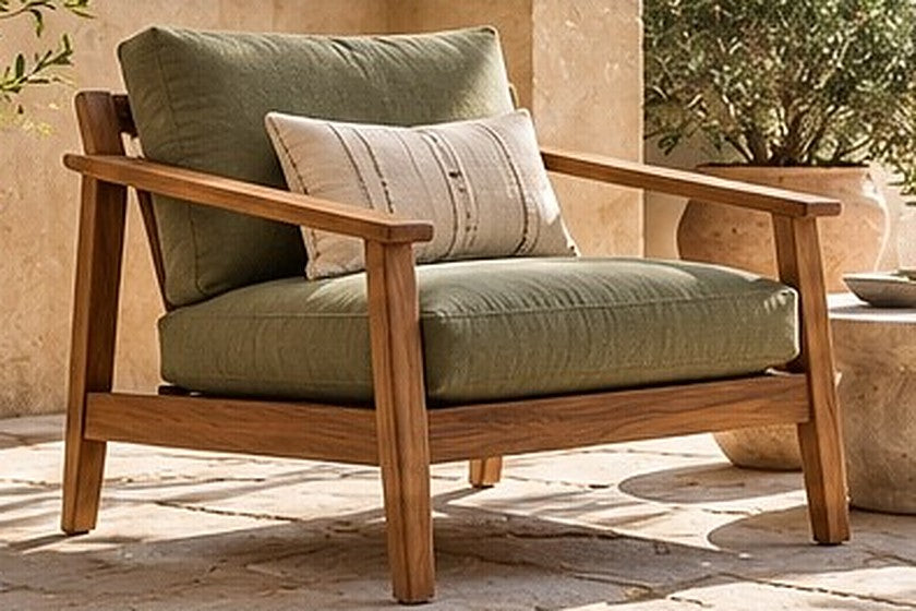 Wooden patio lounge chair with green seat and back cushions